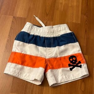 9-12 months Childrens Place swim trunks orange/white/blue
